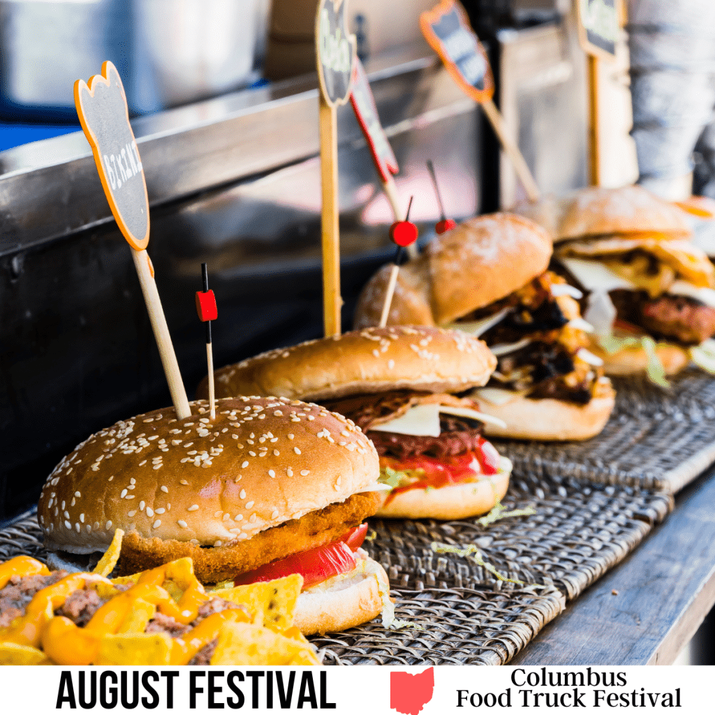 A square image of a photo of four sandwiches on buns and nachos with cheese and other ingredients. A white strip across the bottom has text August Festival Columbus Food Truck Festival.