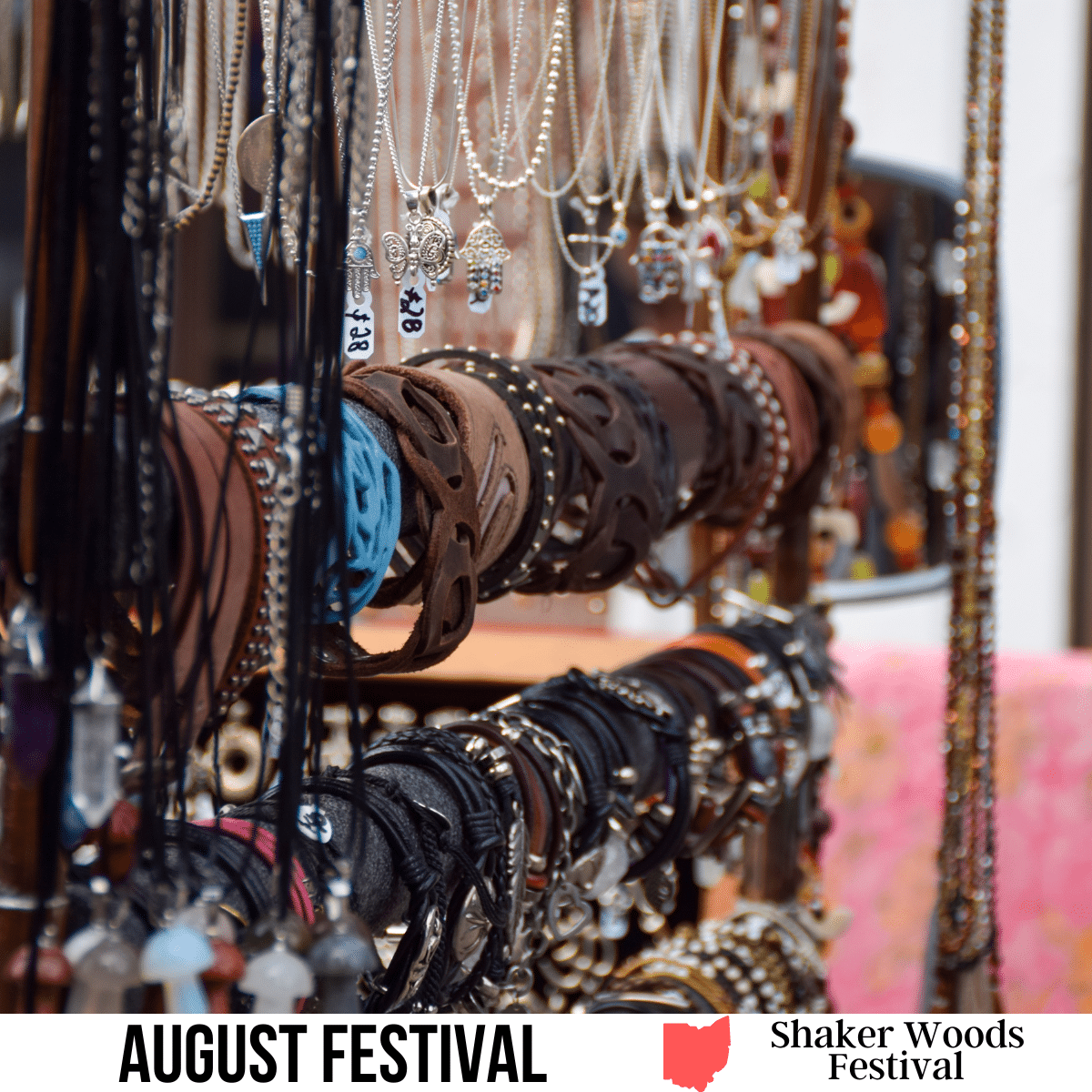 A square image of a photo of handmade necklaces and bracelets on a display rack. A white strip across the bottom has text August Festival Shaker Woods Festival.