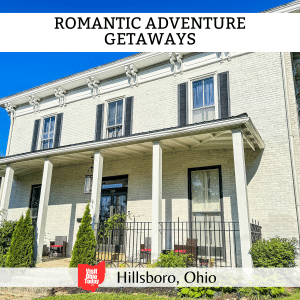 square image with a photo of the outside of Romantic Adventure Getaways at Hillsboro. A white strip across the top has the text Romantic Adventure Getaways and a white strip across the bottom has the text Hillsboro Ohio