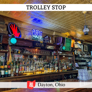 square image with a photo of the bar in the Trolley Stop. A white strip across the top has the text Trolley Stop, and a white strip across the bottom has the text Dayton, Ohio