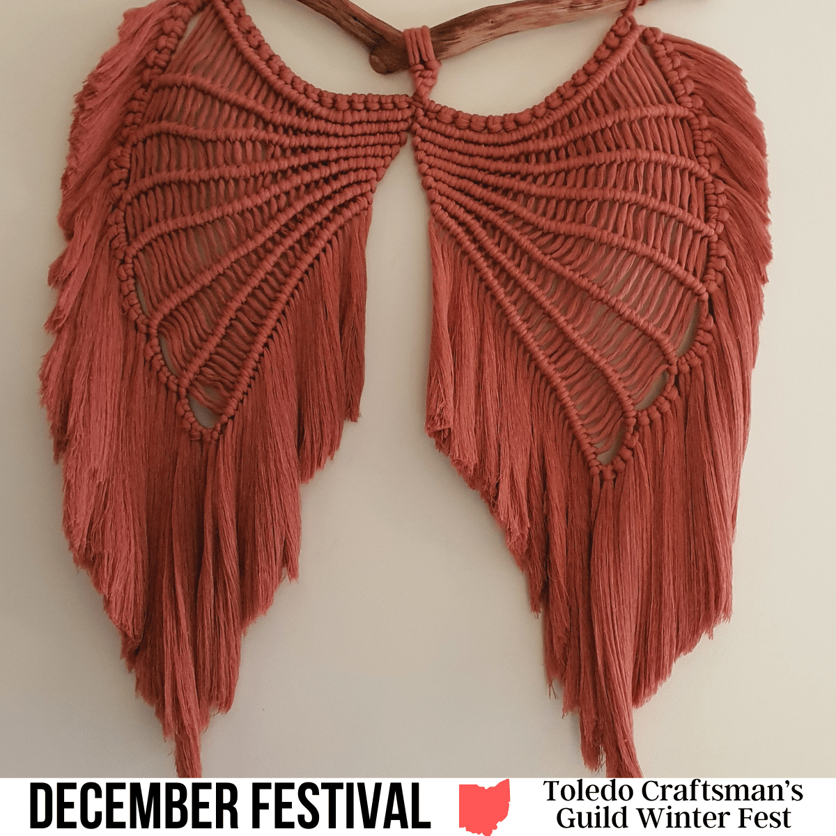 A square image of a photo of handcrafted wings out of a red/orange-colored string. A white strip across the bottom has text December Festival Toledo Craftsman’s Guild Winter Fest.