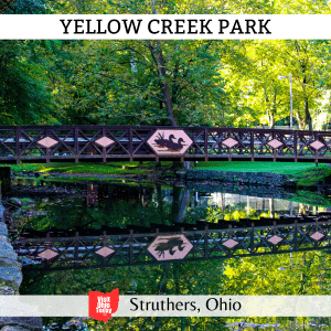 square image with a photo of a bridge over the creek at Yellow Creek Park. A white strip across the top has the text Yellow Creek Park, and a white strip across the bottom contains the text Struthers, Ohio