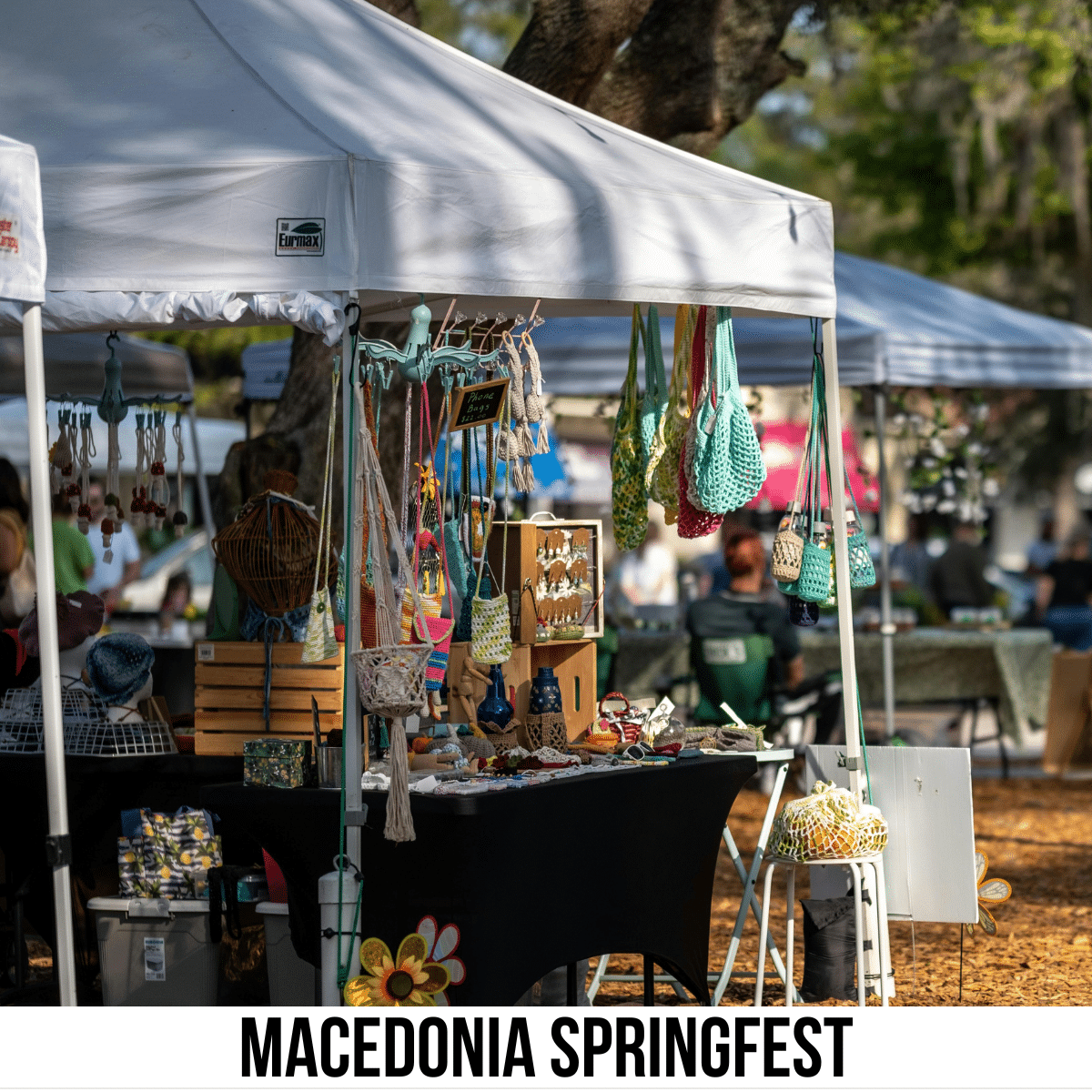 square image with a photo of a booth at an outdoor craft fair A white strip across the bottom has the text Macedonia SpringFest