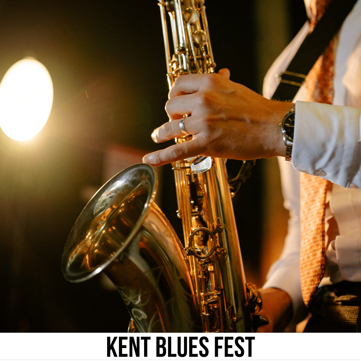 square image with a close up photo of a saxophone player. A white strip across the bottom has the text Kent Blues Fest