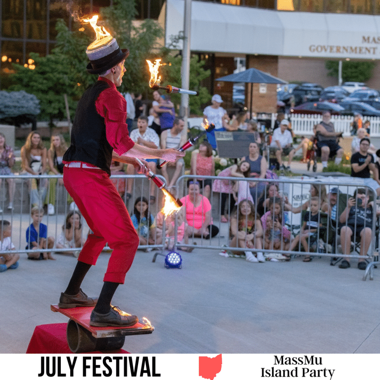 square image with a photo of a fire juggler at the event. A white strip across the bottom has the text July Festival. Massmu Island Party