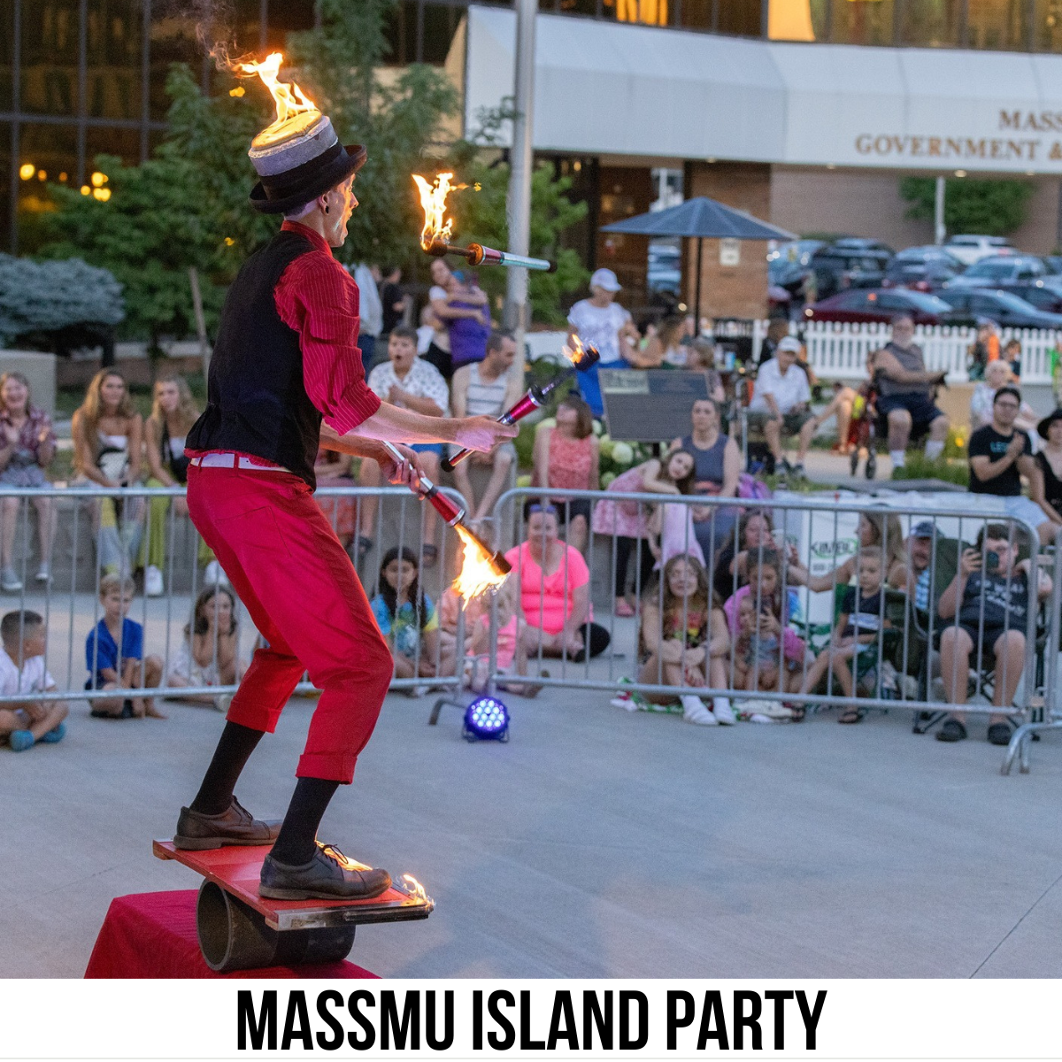square image with a photo of a fire juggler at the event. A white strip across the bottom has the text Massmu Island Party