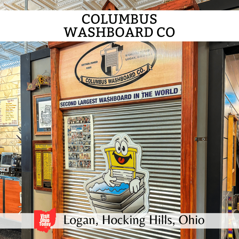 square image with a photo of the world's second largest washboard. A white strip across the top has the text Columbus Washboard Company, and a white strip across the bottom has the text Logan, Hocking Hills, Ohio