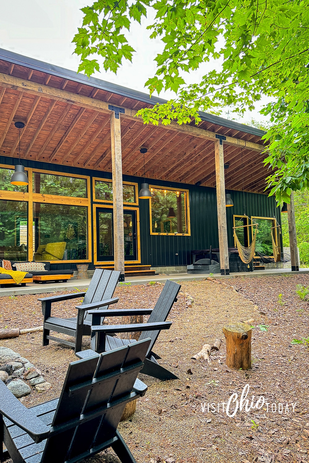 vertical photo of the Wren, showing the fire pit, the property, and patio area. Photo credit: Cindy Gordon of VisitOhioToday.com