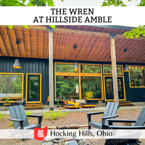 square image with a photo of the outside of the Wren and the patio area. A white strip across the top has the text The Wren at Hillside Amble, and a white strip across the bottom has the text Hocking Hills, Ohio