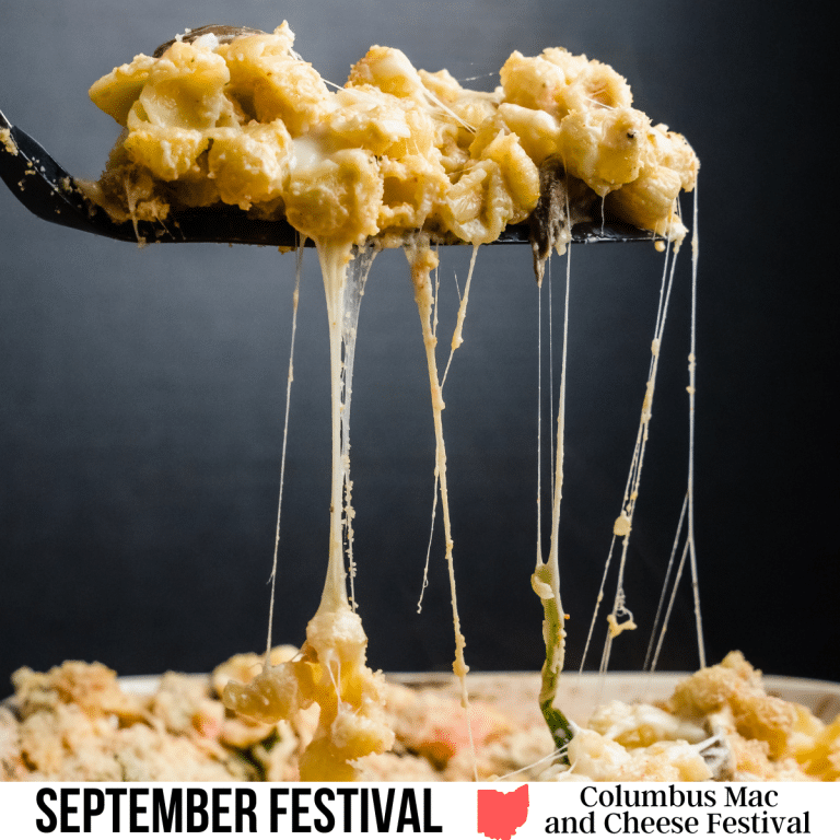 square image with a photo of a forkful of mac and cheese lifted out of a bowl. A white strip across the bottom has the text September Festival. Columbus Mac and Cheese Festival