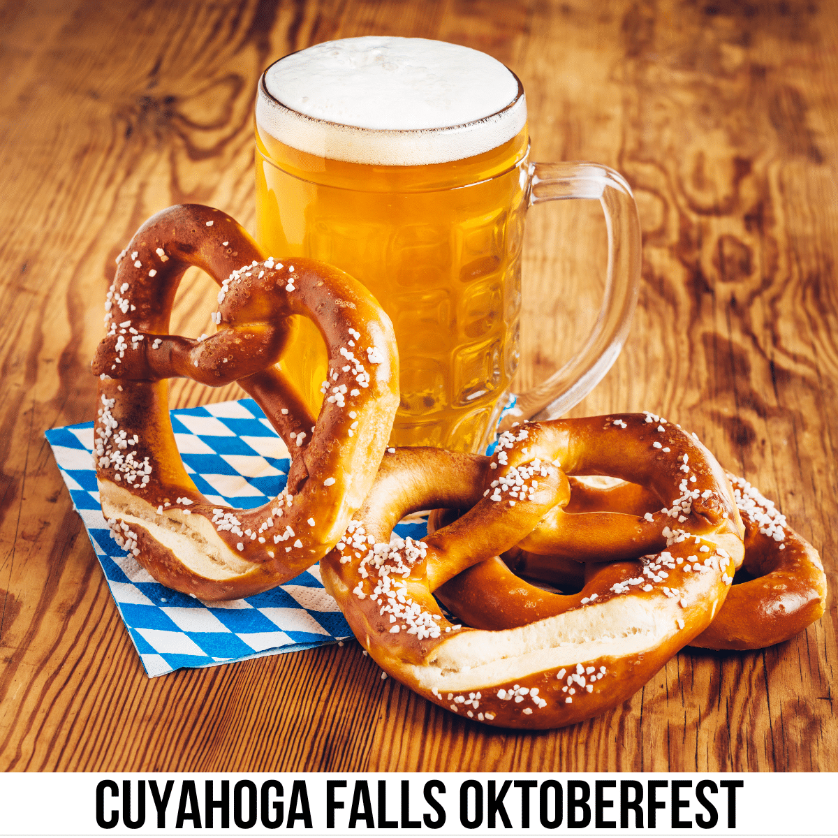 square image with a photo of a stein of beeer and some German pretzels. A white strip across the bottom has the text Cuyahoga Falls Oktoberfest