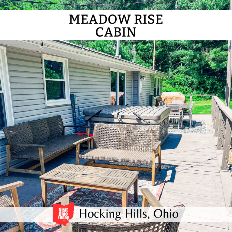 square image with a photo of the outside seating area and hot tub at the cabin. A white strip across the top has the text Meadow Rise Cabin, and a white strip across the bottom has the text Hocking Hills, Ohio