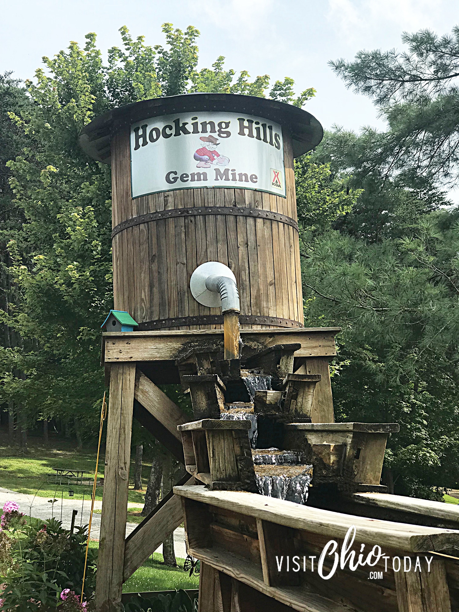 vertical photo of the sluice at Hocking Hills Gem Mining at KOA Holiday. Photo credit: Cindy Gordon of VisitOhioToday.com