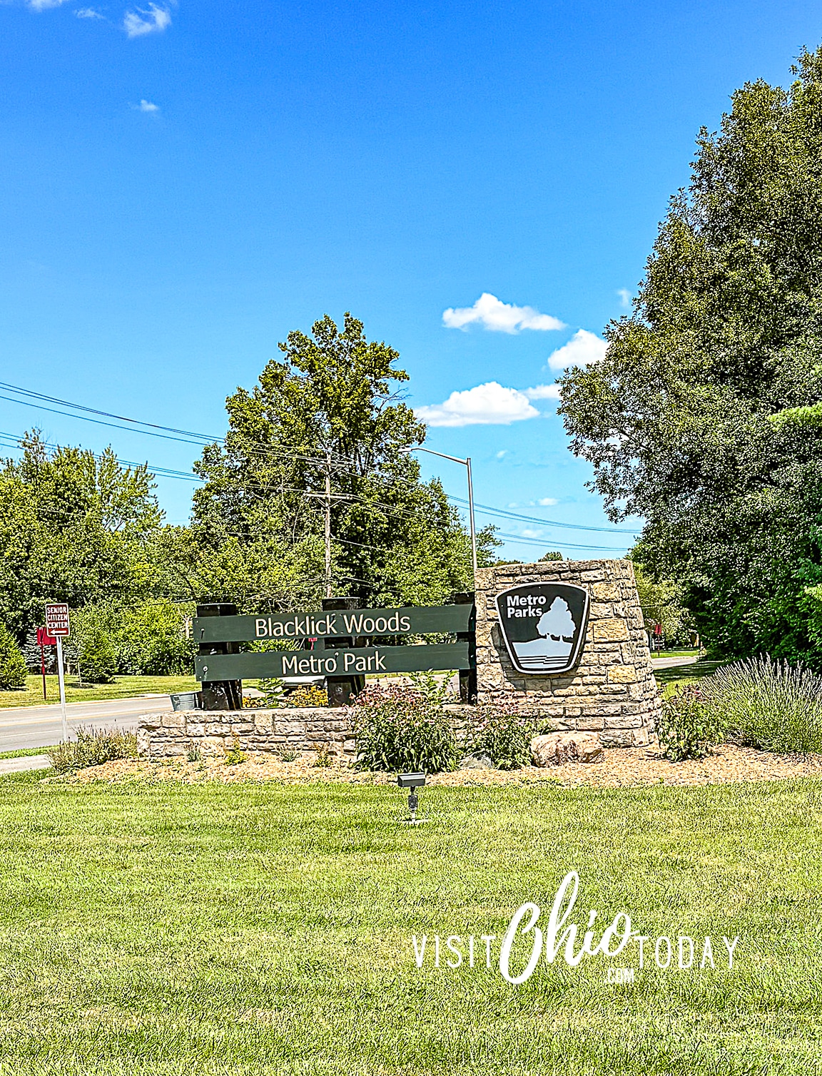 vertical photo of entrance sign to Blacklick Woods Metro Park. Photo credit: Cindy Gordon of VisitOhioToday.com
