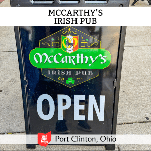 square image with a photo of the 'Open' sign outside McCarthy's Irish Pub